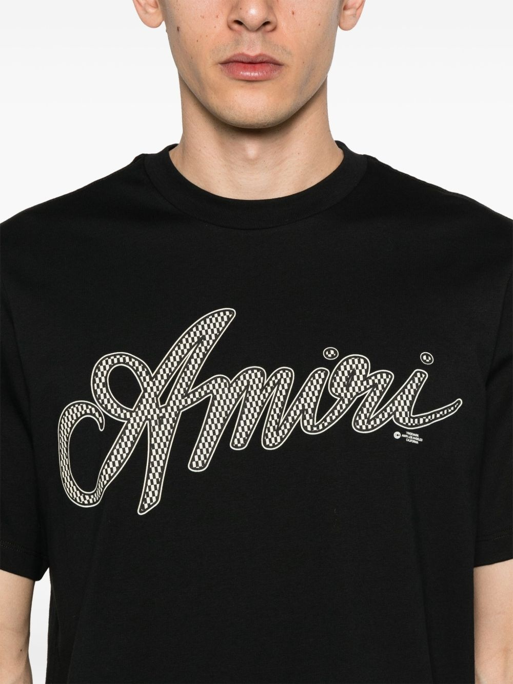 Amiri Script Logo T-shirt in zwart