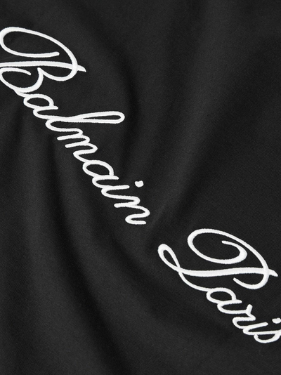 Balmain-logo geborduurd losvallend T-shirt in zwart