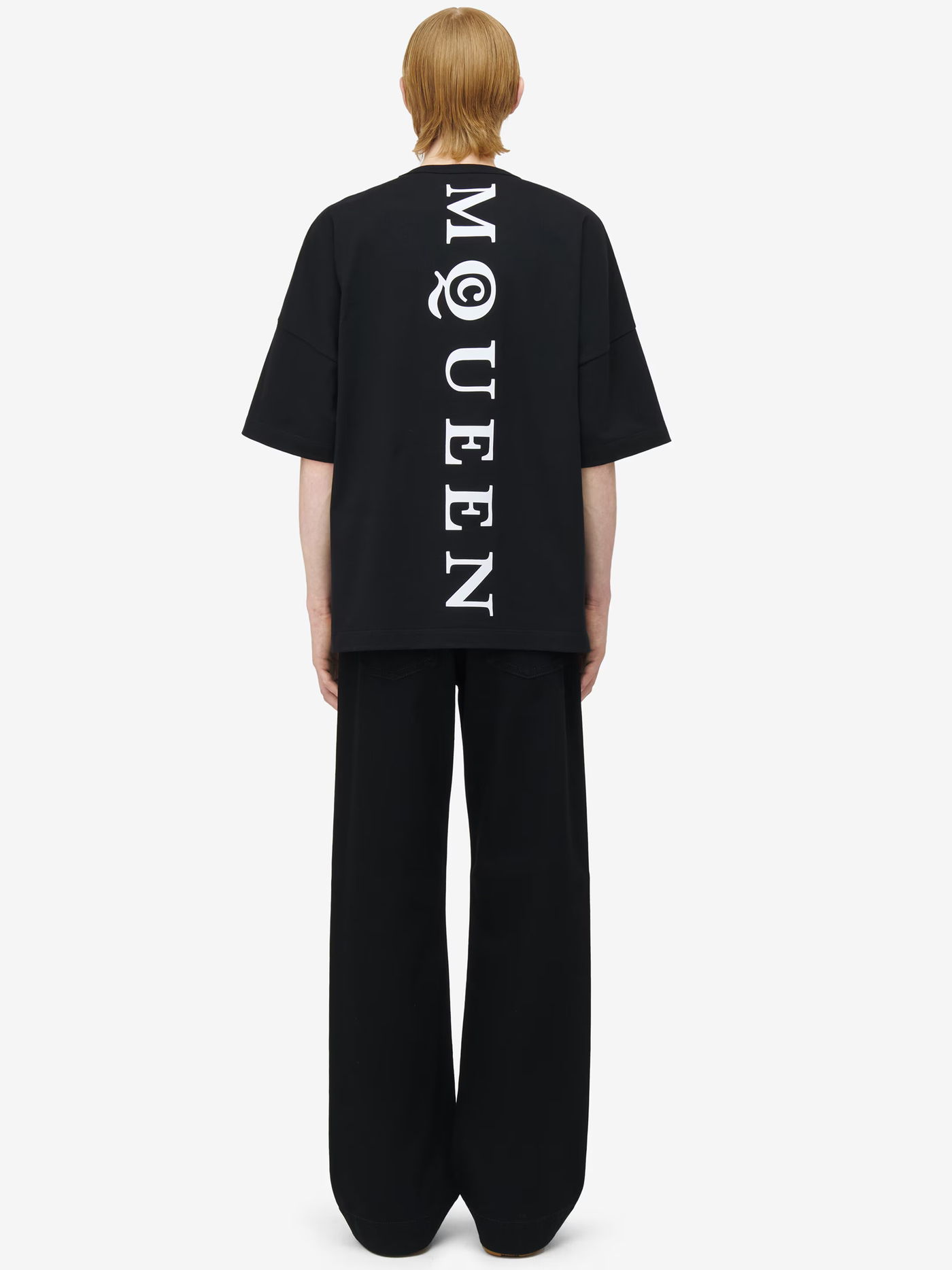 Alexander McQueen Oversized T-shirt met verticaal logo op de rug in zwart